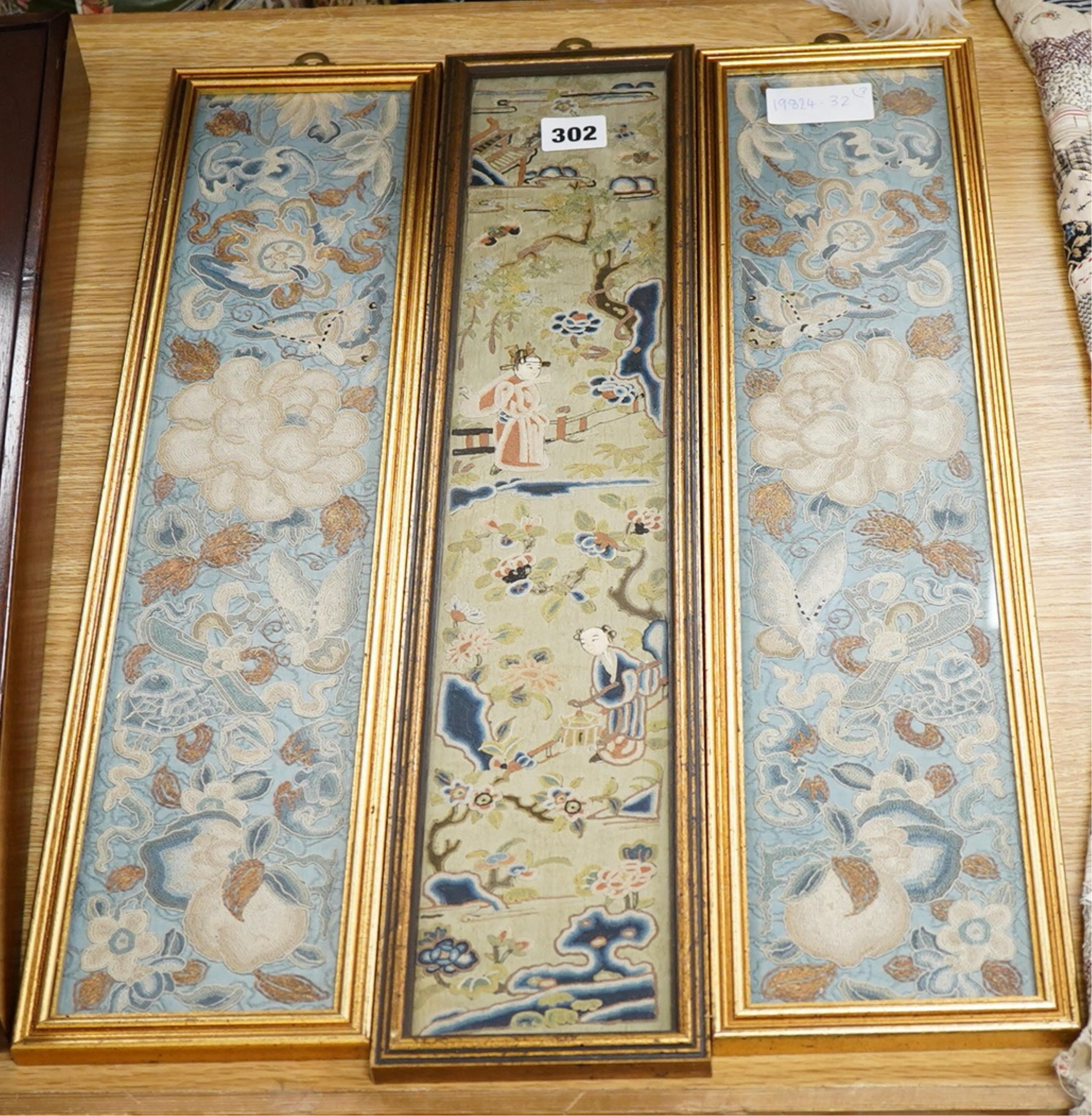 Three late 19th / early 20th century Chinese Peking Chinese knot sleeve bands including a pair of floral and butterfly blue silk sleeve bands and a single green damask figural sleeve band, 52cm x 9.5cm. Condition - good,